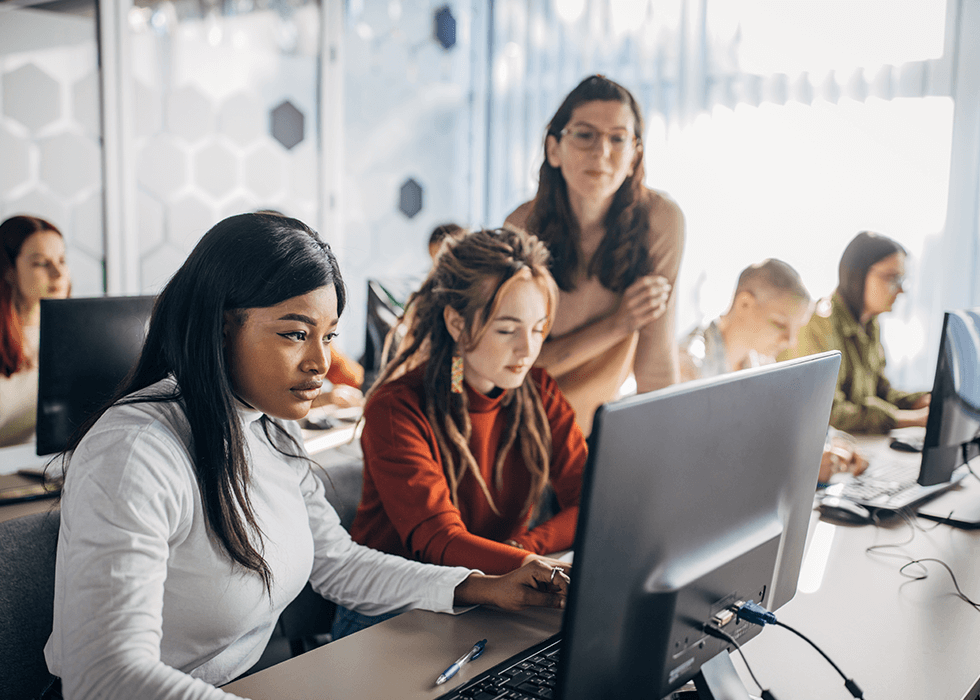 College students using tech in the classroom