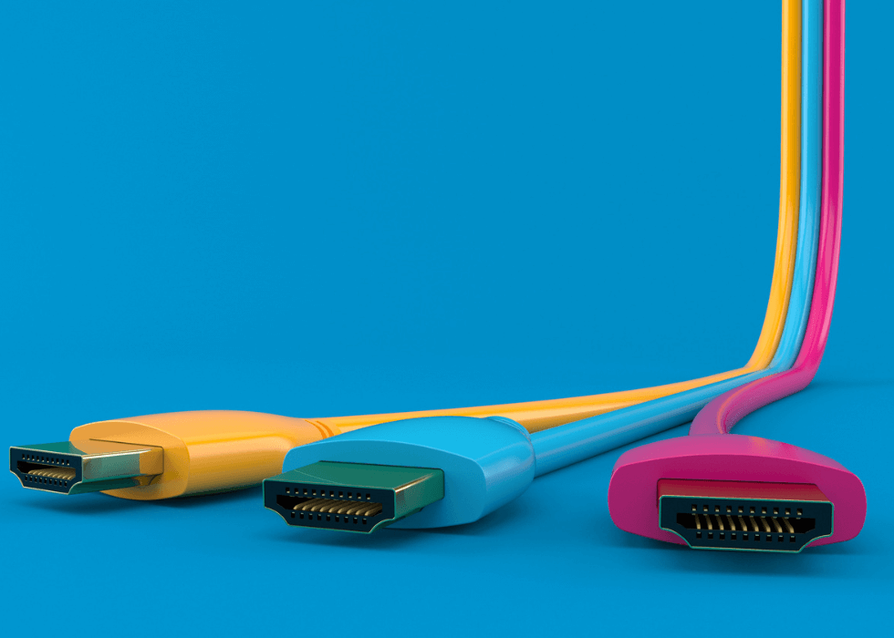 HDMI_cables Colored HDMI cables on blue background