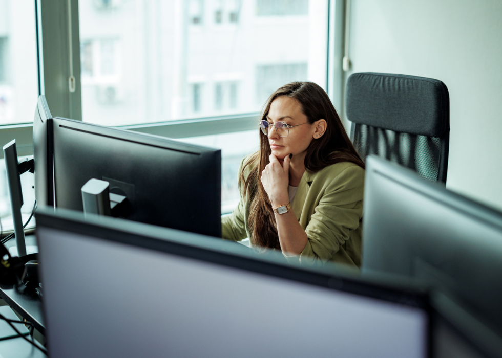 securing-av-systems-against-network-threats Young well dressed businesswoman working at the office
