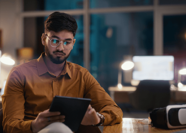 Man reading news on a tablet