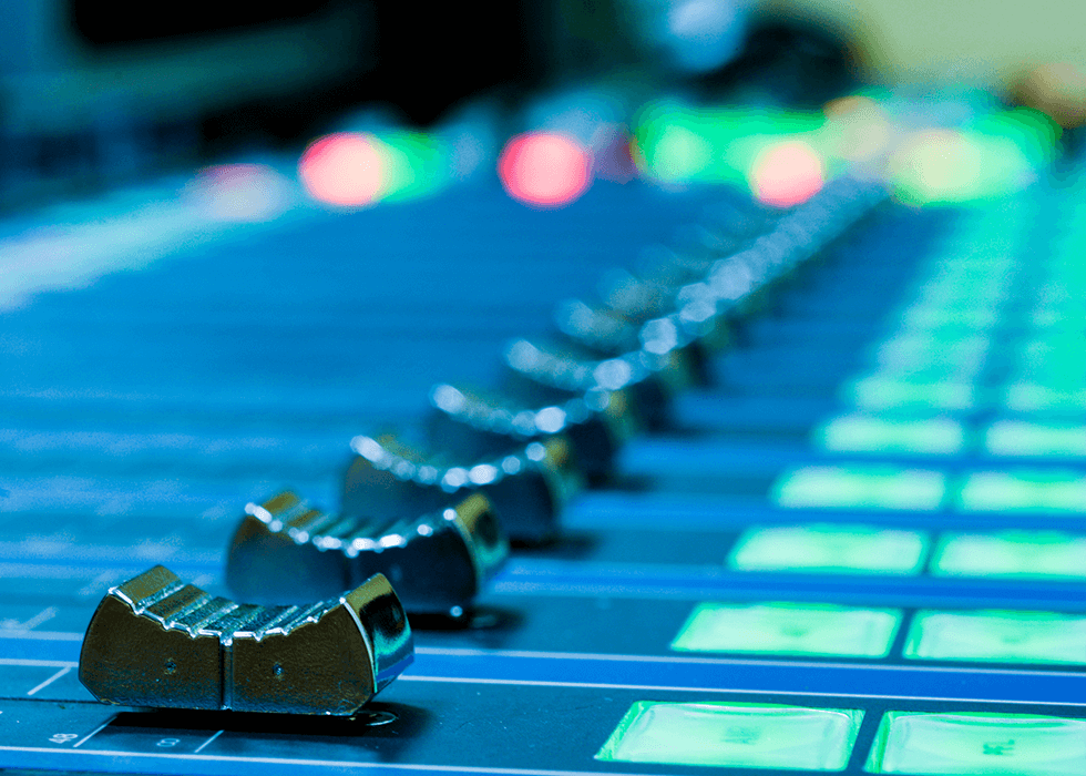 news_roundup_june_2025 close-up of audio soundboard