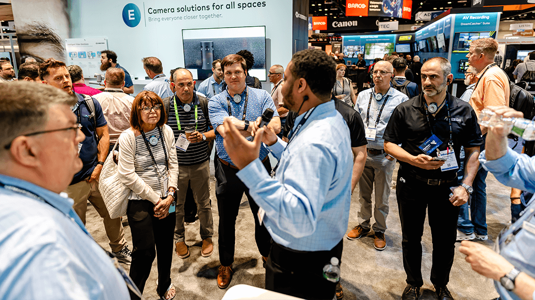 InfoComm attendees at a show floor tour