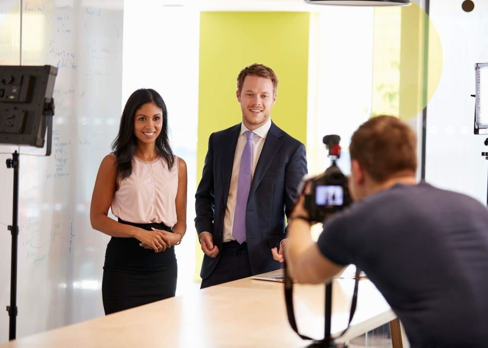 corporate-videographer People being recorded by corporate videographer