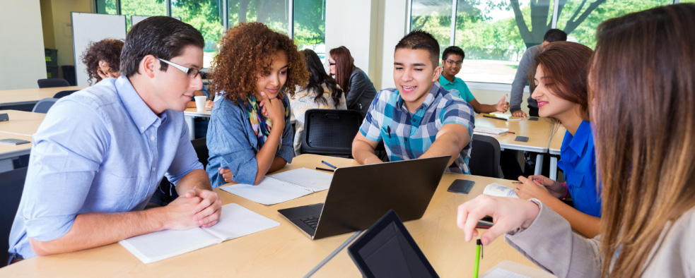 av students learning together in classroom