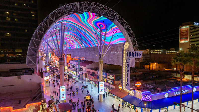 Illuminated Gateway Arches Welcome Visitors to Downtown Las Vegas