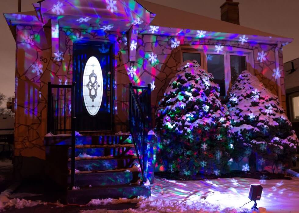 christmas_projector_lights Christmas lights projected on a house